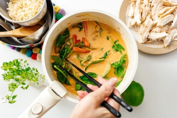 Making soup for Thai red curry ramen | www.iamafoodblog.com