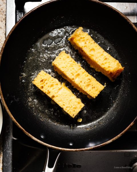 This is going to be the best French toast you’ll ever eat! Cure your churro and French toast cravings with these golden brown crispy French toast sticks dipped in cinnamon and sugar. Dark chocolate dipping sauce not optional! #breakfast #brunch #recipes #frenchtoast #churros #cinnamonsugar #frenchtoaststicks