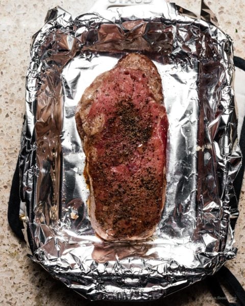 Oven roasted steak with Japanese chimichurri, roasted bone marrow, and jammy eggs