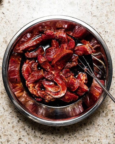 This super easy 7 ingredient ginger beef and onion stir fry is the answer to what’s for dinner tonight #stirfry #beefstirfry #dinner #recipes #quickandeasy #gingerbeef #betterthantakeout