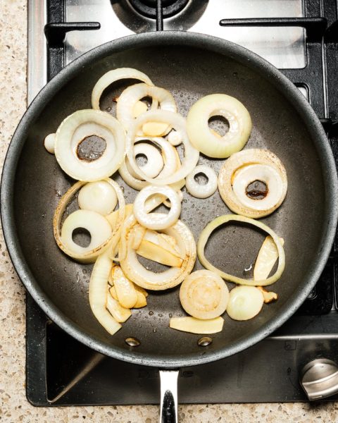 This super easy 7 ingredient ginger beef and onion stir fry is the answer to what’s for dinner tonight #stirfry #beefstirfry #dinner #recipes #quickandeasy #gingerbeef #betterthantakeout