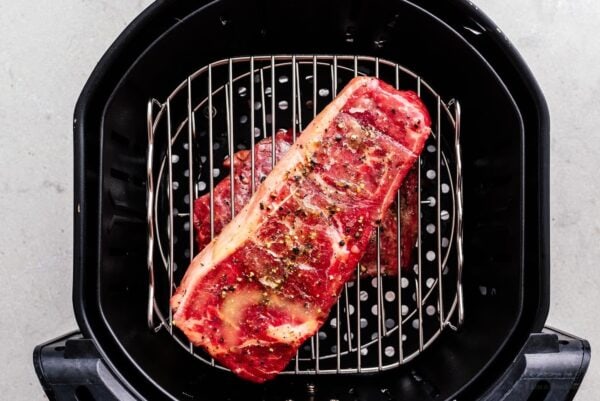 steaks in air fryer basket | www.iamafoodblog.com