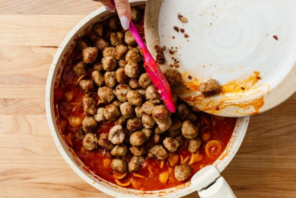 adding meatballs to mini meatball pasta | www.iamafoodblog.com